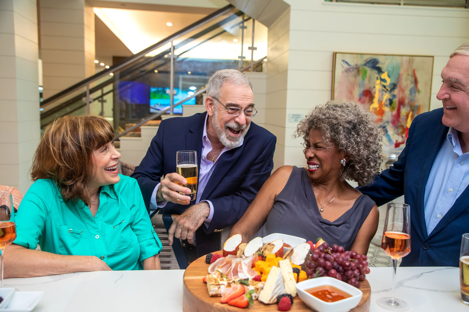 Residents laughing at happy hour