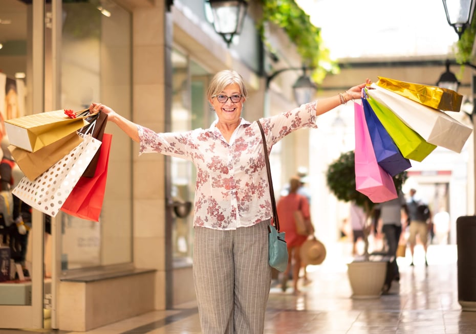 Active senior women shopping